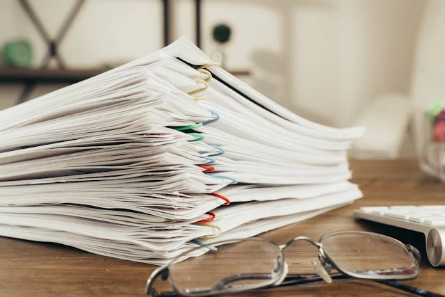 A Close-Up Shot of Paper Clipped Documents